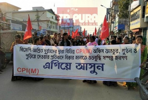 CPI-M walked big protest-march after 3 Party Offices burnt in Agartala CPI-M walked big protest-march after 3 Party Offices burnt in Agartala